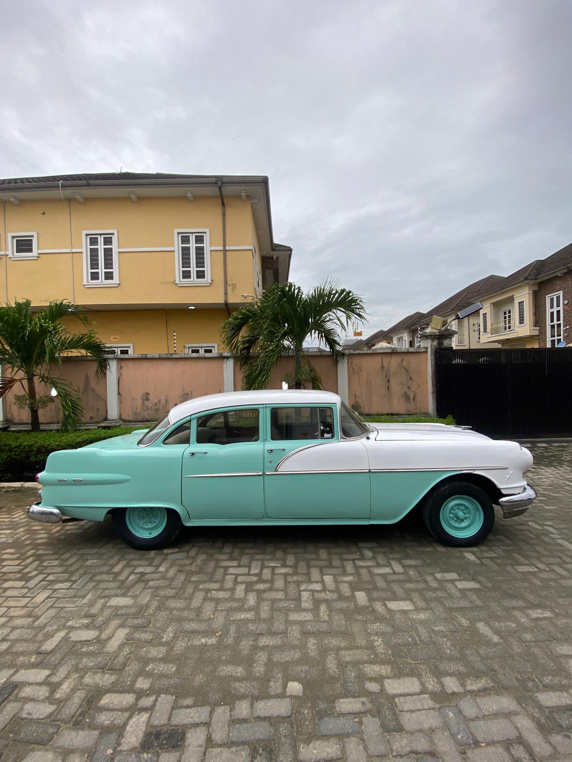 Green and White Pontiac Chieftain 1956 - 10 Hours Rent