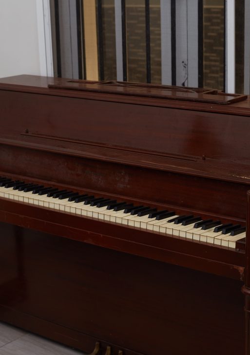 Vintage Dark Brown Upright Piano